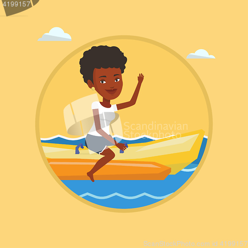 Image of Tourists riding a banana boat vector illustration.