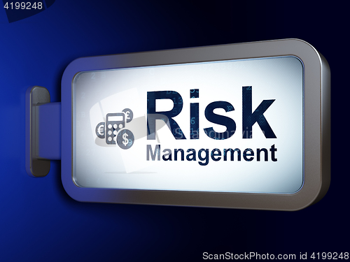 Image of Finance concept: Risk Management and Calculator on billboard background