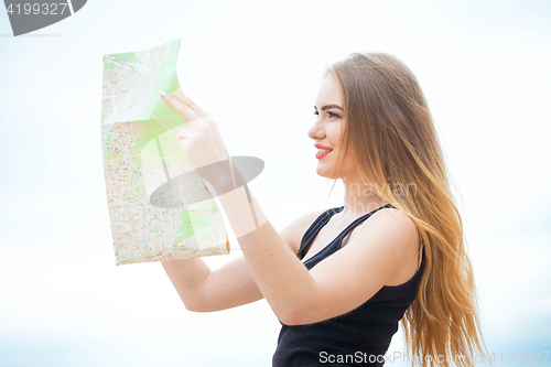 Image of Young traveler searching road