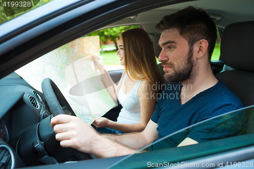 Image of Couple of young people traveling