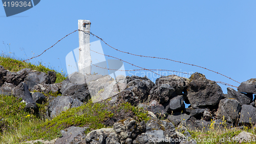 Image of Barrier with barbed wire