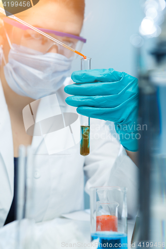 Image of Young lab with chemical substances