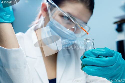 Image of Laboratory assistant at chemistry lab