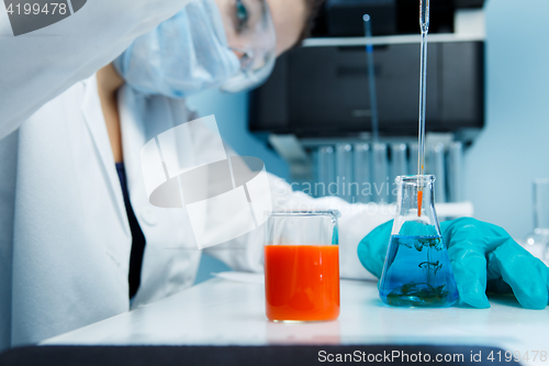 Image of Girl with bulb on desk