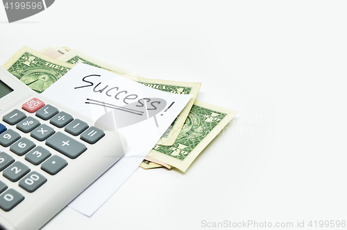 Image of Calculator, money and success word