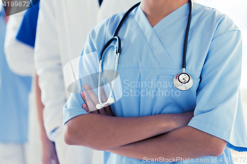 Image of close up of african female nurse with stethoscope