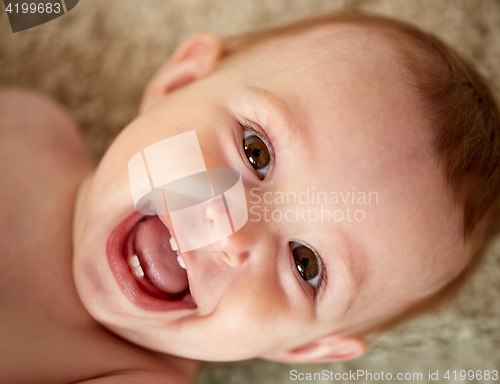 Image of close up of happy little baby boy or girl face