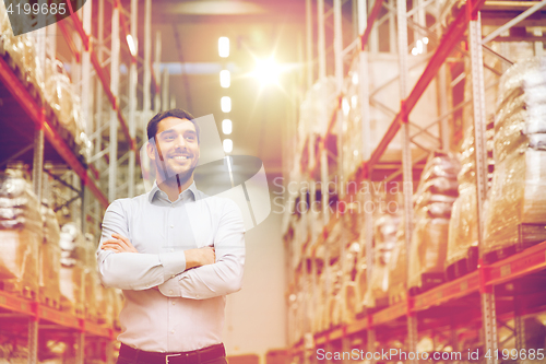 Image of happy man at warehouse