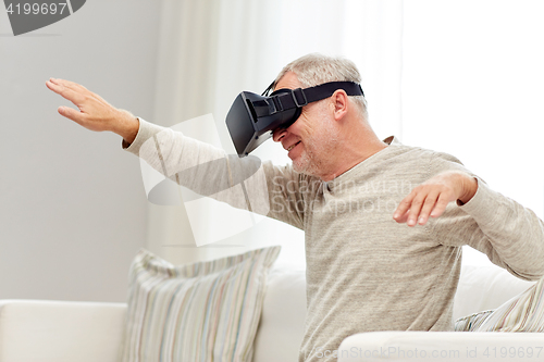 Image of old man in virtual reality headset or 3d glasses