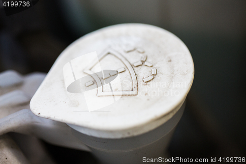 Image of washer tank cap in car