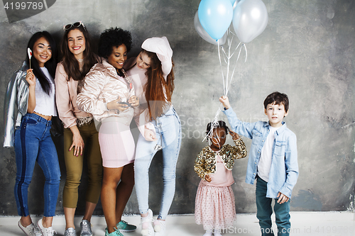 Image of Lifestyle and people concept: young pretty diversity nations woman with different age children celebrating on birth day party together happy smiling, making selfie. African-american, asian and caucasi