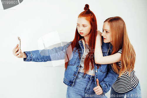 Image of best friends teenage girls together having fun, posing emotional on white background, besties happy smiling, lifestyle people concept 