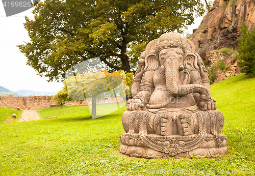 Image of Ganesha statue in a beautiful mountain garden