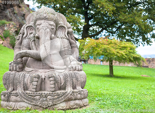 Image of Ganesha statue in a beautiful mountain garden