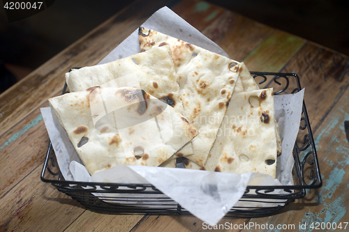 Image of  naan bread  basket fresh baked