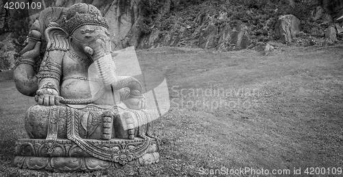 Image of Ganesha statue in a beautiful mountain garden