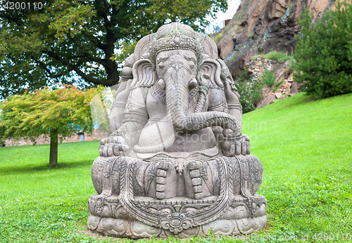 Image of Ganesha statue in a beautiful mountain garden