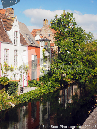 Image of   Bruges Belgium historic houses on canal Europe 