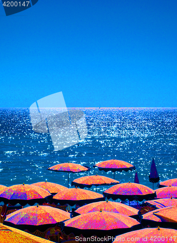 Image of umbrellas  beach in Nice, France The French Riviera 