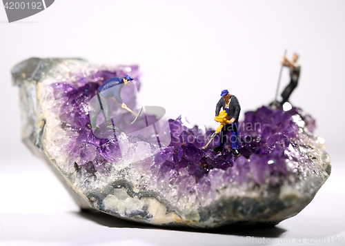 Image of Miniature Workers in the Mining of Minerals Field