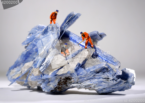 Image of Miniature Workers in the Mining of Minerals Field