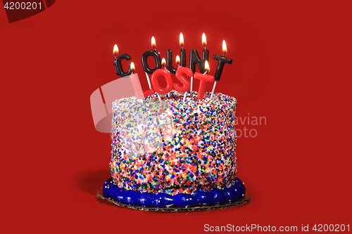 Image of Birthday Celebration Candles on Red Background