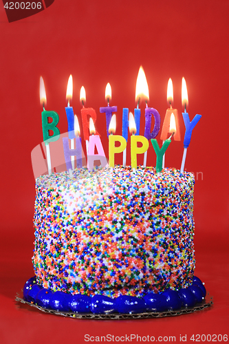 Image of Birthday Celebration Candles on Red Background