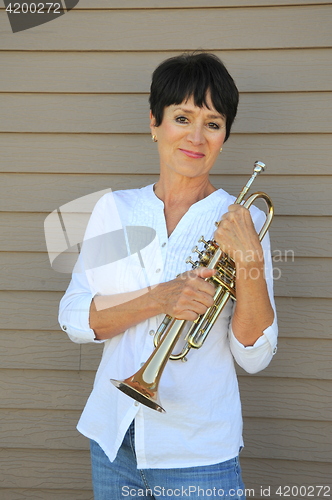 Image of Female trumpet player.