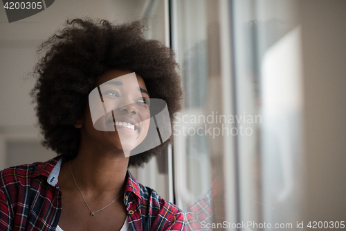 Image of portrait of a young beautiful black woman