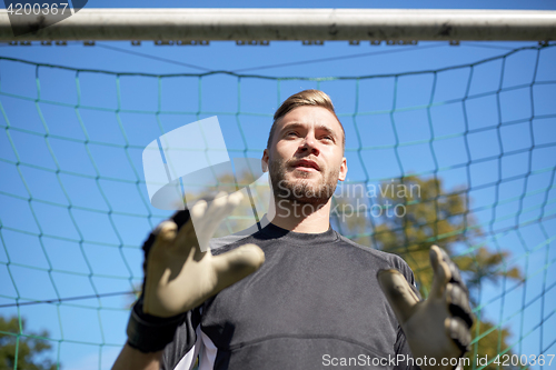 Image of goalkeeper or soccer player at football goal