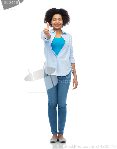 Image of happy african american woman showing thumbs up