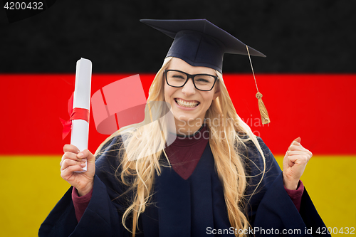Image of happy female student with diploma over german flag