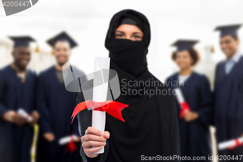 Image of muslim student woman in hijab with diploma