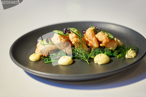 Image of close up of prawn salad with jalapeno and wakame