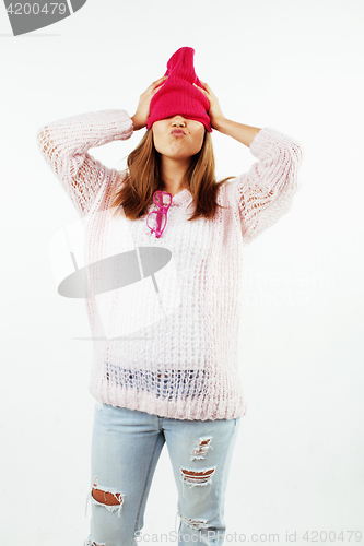 Image of young pretty teenage hipster girl posing emotional happy smiling on white background, lifestyle people concept 