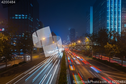 Image of Light trails on motorway highway at night