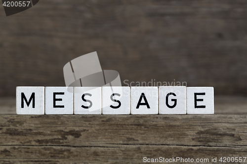 Image of Message, written in cubes    