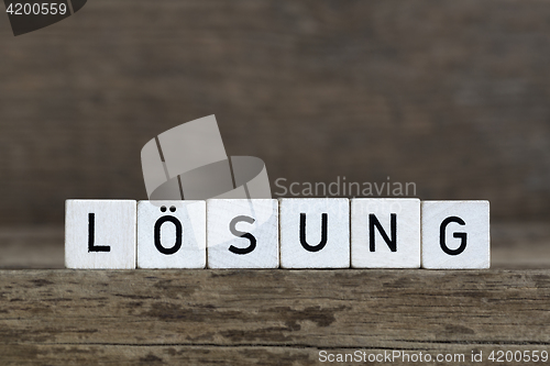 Image of German word solution, written in cubes