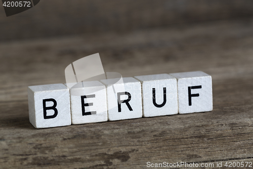 Image of German word profession, written in cubes