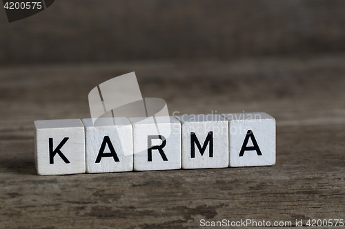 Image of Karma, written in cubes    