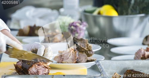Image of Preparing meat on the table