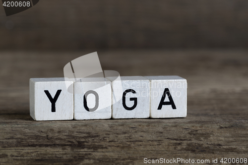 Image of Yoga, written in cubes