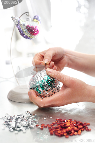 Image of Sequined Christmas ornaments