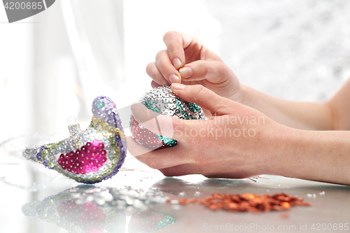 Image of Sequined Christmas ornaments