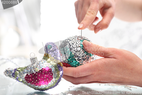 Image of Beautiful Christmas decorations, sequined Christmas ornaments