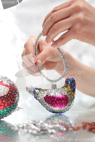 Image of The idea for a Christmas present, handmade sequin decoration