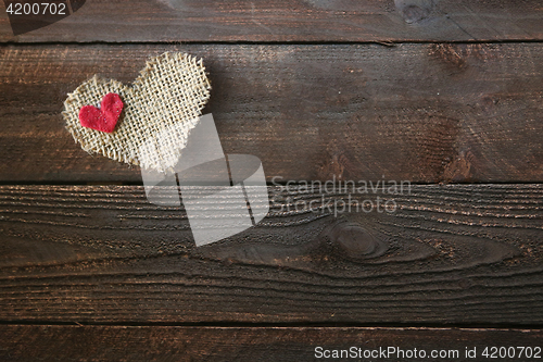 Image of Heart on a Wooden Background With Copy Space