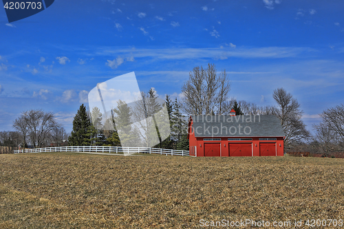 Image of Peaceful Red Barn in the Countryside Iowa, USA