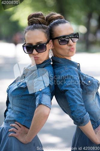 Image of twin sister with sunglasses