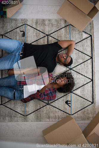 Image of Top view of attractive young African American couple